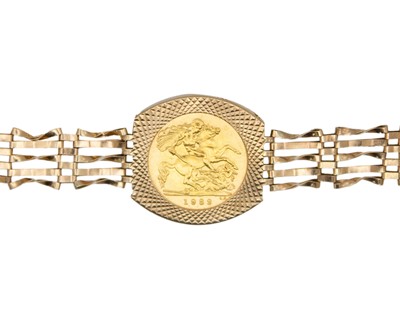 Lot 39 - A 9k yellow gold bracelet, mounted with a half-sovereign.