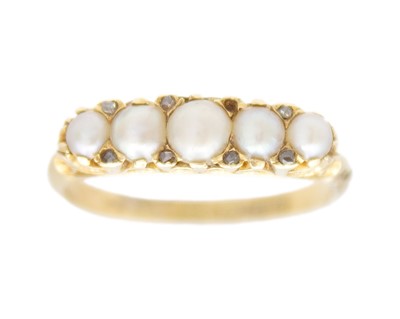Lot 25 - A Victorian 18k split pearl set half hoop ring, with diamond points.