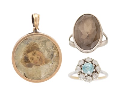 Lot 211 - A Victorian gold-mounted double-sided pendant, a topaz cluster ring & a silver quartz set ring.