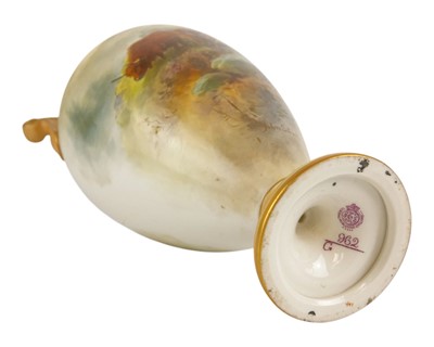 Lot 712 - A Royal Worcester porcelain baluster vase.