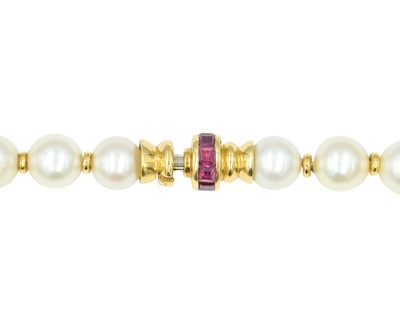 Lot 86 - An impressive pearl necklace, with heavy 18k pavé diamond, ruby & tourmaline set sculptural pendant.