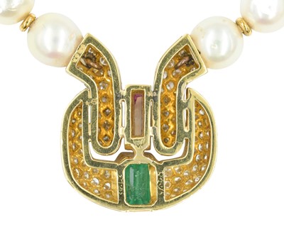 Lot 86 - An impressive pearl necklace, with heavy 18k pavé diamond, ruby & tourmaline set sculptural pendant.