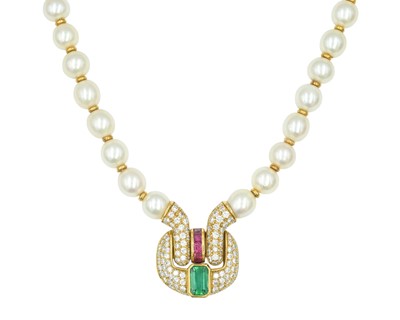 Lot 86 - An impressive pearl necklace, with heavy 18k pavé diamond, ruby & tourmaline set sculptural pendant.