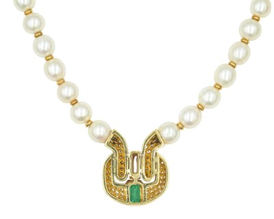 Lot 86 - An impressive pearl necklace, with heavy 18k pavé diamond, ruby & tourmaline set sculptural pendant.