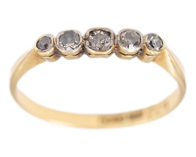 Lot 130 - An 18k yellow gold ring set with rounded single-cut diamonds.