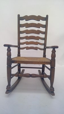 Lot 3207 - A Lancashire style elm rocking chair, with...