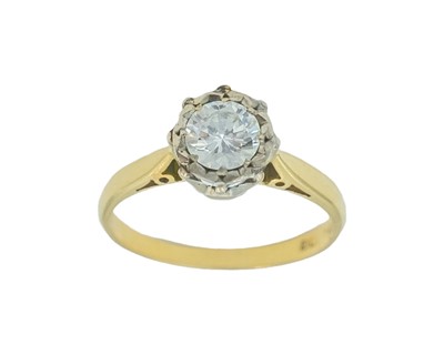Lot 100 - An 18k yellow gold and platinum diamond-set solitaire ring.