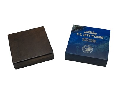 Lot 36 - S.S. CITY OF CAIRO; two cased encapsulated One Rupee silver coins recovered from S.S City of Cairo.