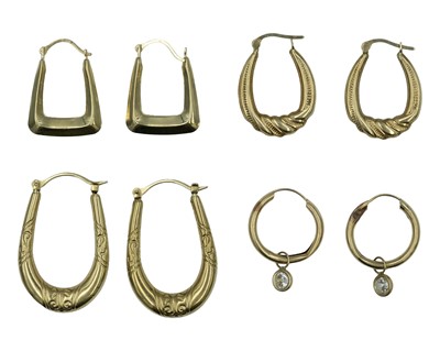 Lot 99 - A group of 9k yellow gold hoop earrings.