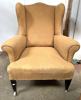 Lot 3062 - An Edwardian upholstered wing back armchair,...