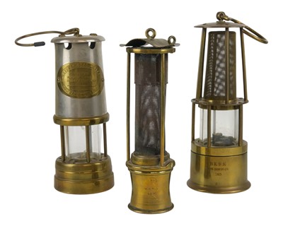 Lot 6 - Three miners' lamps.