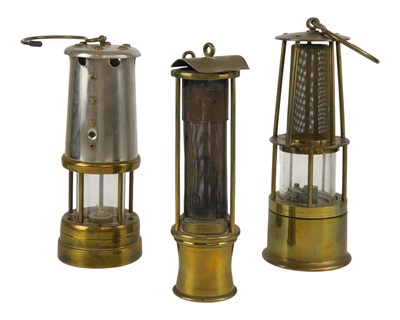 Lot 6 - Three miners' lamps.