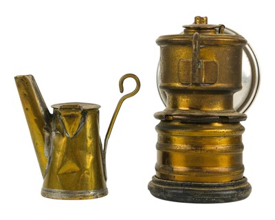 Lot 40 - A 19th century brass tallow miner's lamp.