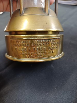 Lot 76 - A Rare Thornton & Sons brass Eloin's improved Miner's safety lamp.