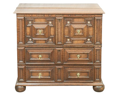 Lot 828 - A 17th century oak and fruitwood veneered chest.