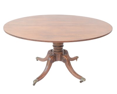 Lot 934 - A Regency mahogany oval tilt top supper table.