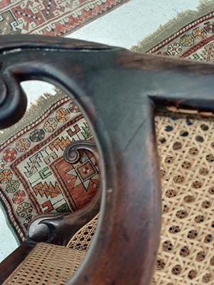 Lot 935 - A Regency rosewood bergere library armchair.