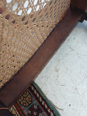 Lot 935 - A Regency rosewood bergere library armchair.
