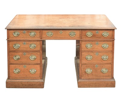 Lot 920 - A Victorian walnut kneehole desk.