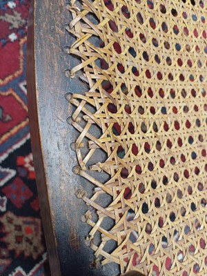 Lot 888 - A Regency simulated coramandel wood 'Roman' open armchair.