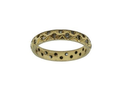 Lot 50 - An 18k yellow gold and white gemstone set ring.