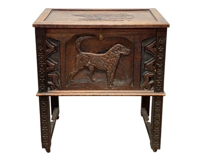Lot 892 - A late Victorian carved oak chest.
