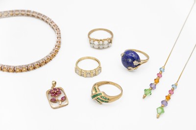 Lot 228 - A selection of gold and silver jewellery.