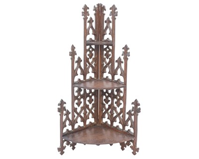 Lot 927 - A Victorian Gothic carved and pierced oak corner bracket.