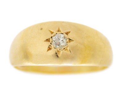 Lot 135 - An 18k hallmarked gold diamond set gypsy ring.
