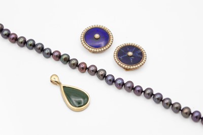 Lot 219 - A 14k pendant and a cultured pearl necklace with a 14k clasp.