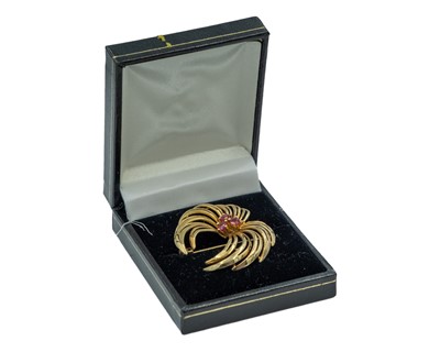 Lot 95 - A 9k yellow gold and ruby brooch.