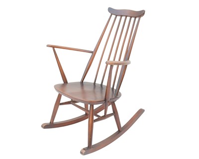 Lot 929 - An Ercol stick back rocking chair.