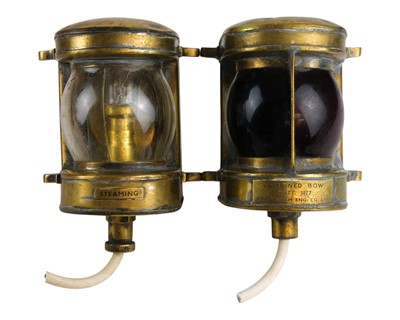 Lot 420 - A brass maritime combined bow lamp.