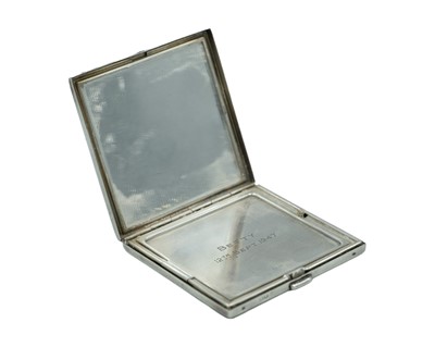 Lot 122 - An Art Deco silver engine-turned powder compact by Adie Brothers Ltd.