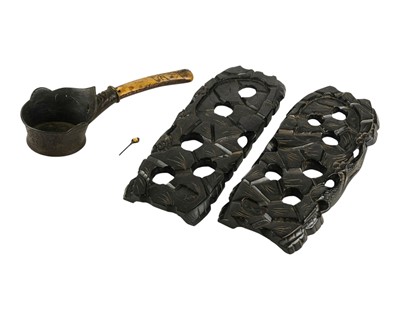 Lot 520 - A Chinese bronze silk iron.