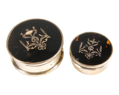 Lot 476 - A George V circular silver pique work trinket box.