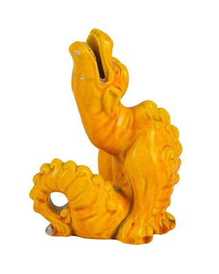 Lot 439 - A Burmantofts grotesque pottery dragon figure.
