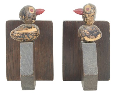 Lot 57 - A pair of Yz style tagua nut bird bookends.