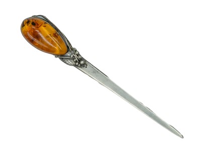 Lot 123 - A Russian 925 silver and amber set paper knife.