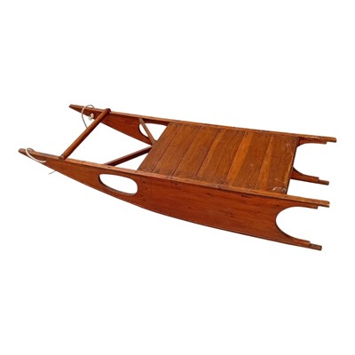 Lot 15 - A vintage wooden Sledge with curved side rails....