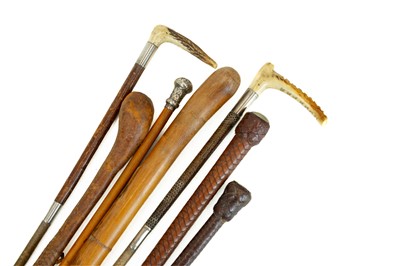 Lot 46 - Two silver mounted children's riding crops.