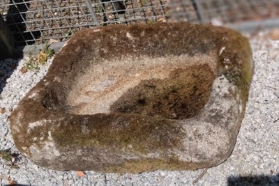 Lot 764 - A weathered granite trough.