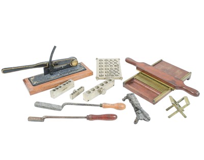 Lot 449 - A mahogany and brass pill maker slab and roller.