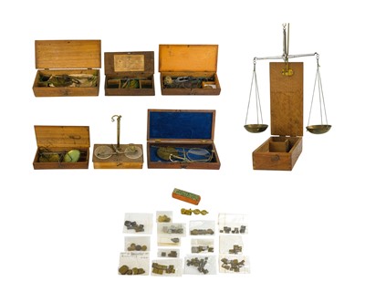 Lot 446 - A collection of Georgian and later cased scales and balances.