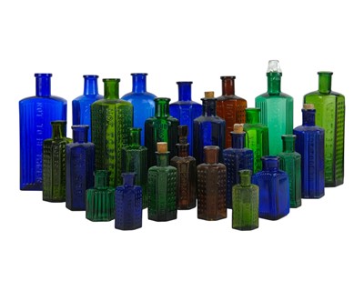 Lot 450 - A collection of blue, green and brown poison bottles.