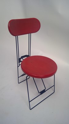 Lot 3064 - An Italian folding "Cricket "chair, designed...