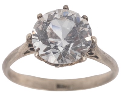 Lot 238 - A white metal and white gemstone ring.