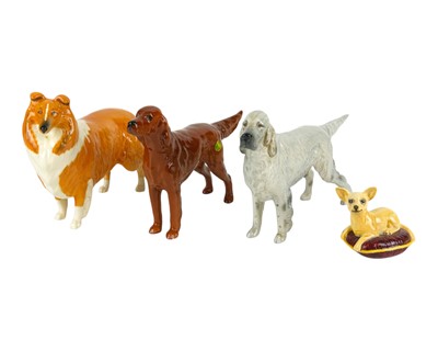Lot 717 - Beswick dogs.