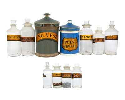 Lot 458 - Nine glass apothecary bottles and stoppers.