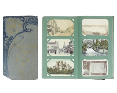 Lot 344 - A large postcard album containing miscellaneous topographical and subject cards including Cornish.